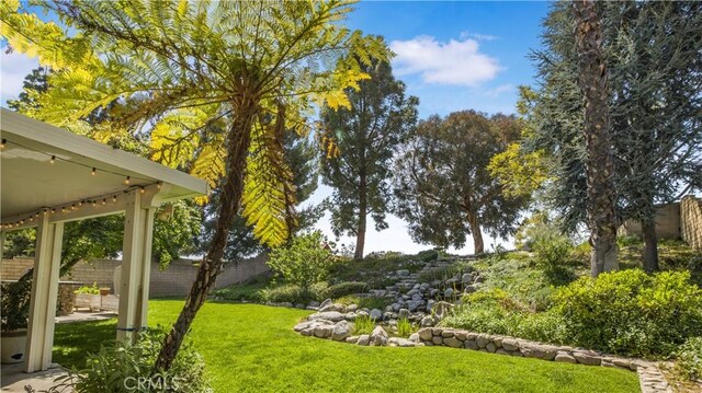 view of yard featuring fence