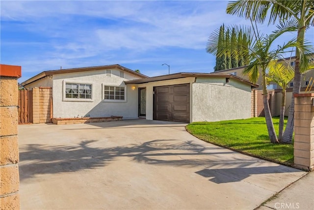1976 Galemont Ave, Hacienda Heights, CA 91745 - view of front of property featuring stucco siding, fence, concrete driveway, and an attached garage