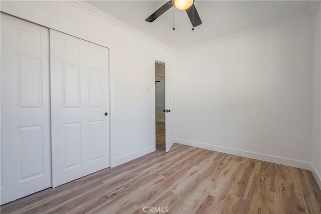 1976 Galemont Ave, Hacienda Heights, CA 91745 - unfurnished bedroom featuring light wood finished floors, a closet, ceiling fan, baseboards, and ornamental molding