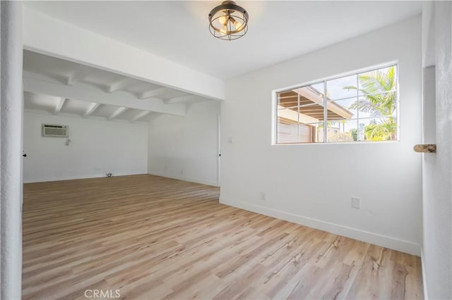 1976 Galemont Ave, Hacienda Heights, CA 91745 - empty room with lofted ceiling with beams, light wood finished floors, a wall mounted AC, and baseboards