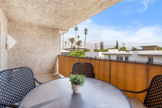 balcony featuring outdoor dining space