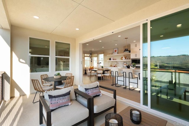 balcony featuring outdoor dining space