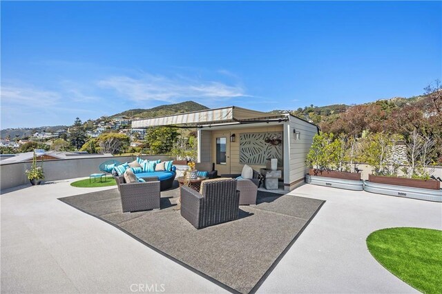 31588 Table Rock Dr, Laguna Beach, CA 92651 - view of patio / terrace featuring an outdoor living space and an outbuilding