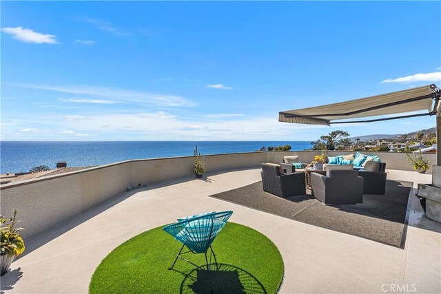 31588 Table Rock Dr, Laguna Beach, CA 92651 - view of patio / terrace with an outdoor living space and a water view