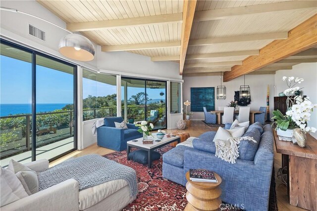 31588 Table Rock Dr, Laguna Beach, CA 92651 - living room with wood finished floors, a water view, and wood ceiling with exposed beams