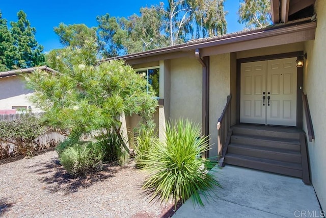 1023 Mimosa Ave, Vista, CA 92081 - view of exterior entry featuring stucco siding