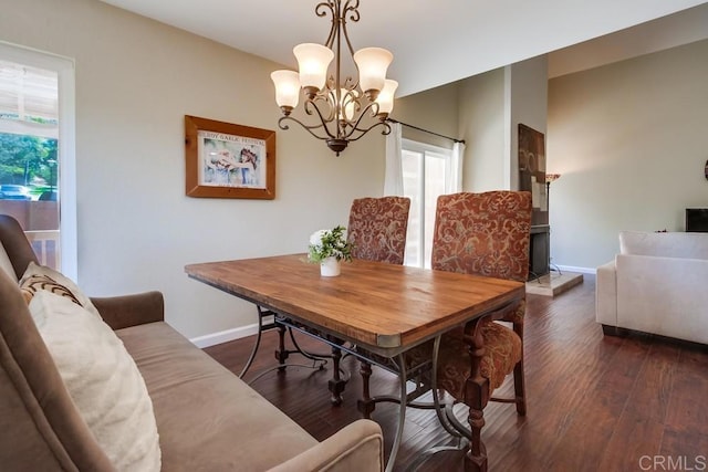 1023 Mimosa Ave, Vista, CA 92081 - dining area featuring a chandelier and dark wood-style floors