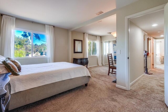 1023 Mimosa Ave, Vista, CA 92081 - bedroom with light carpet and baseboards