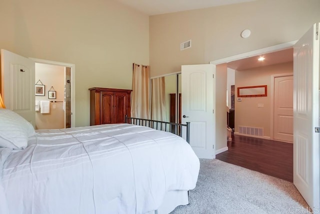 1023 Mimosa Ave, Vista, CA 92081 - bedroom featuring high vaulted ceiling, carpet flooring, and connected bathroom