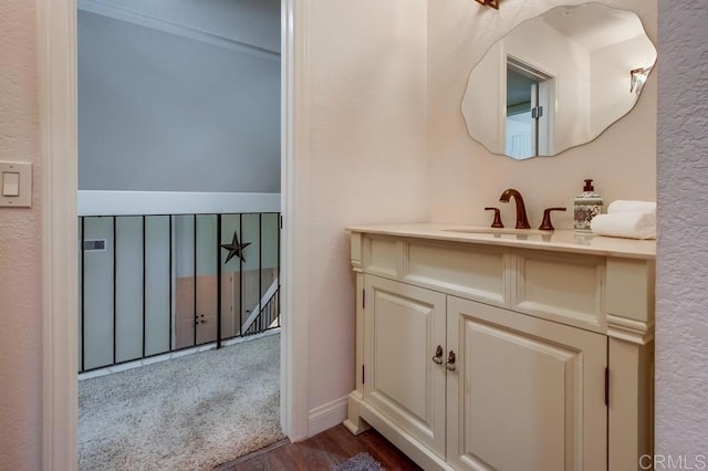 1023 Mimosa Ave, Vista, CA 92081 - bathroom with wood finished floors and vanity