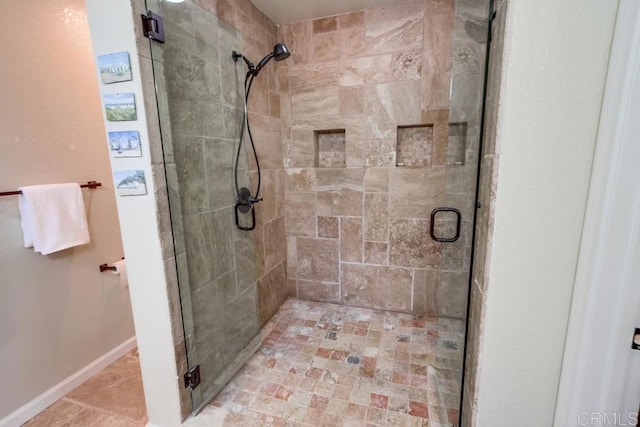 1023 Mimosa Ave, Vista, CA 92081 - bathroom featuring a stall shower and baseboards