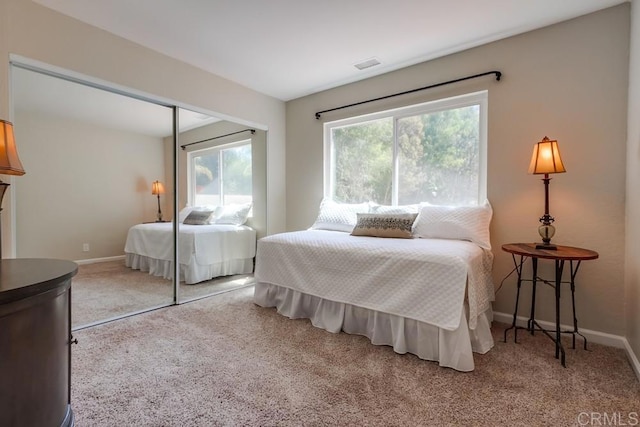 1023 Mimosa Ave, Vista, CA 92081 - carpeted bedroom with a closet and baseboards