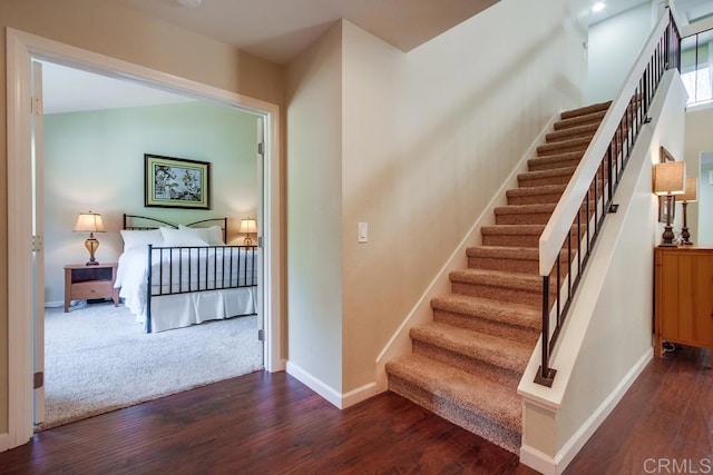 1023 Mimosa Ave, Vista, CA 92081 - staircase with wood finished floors and baseboards