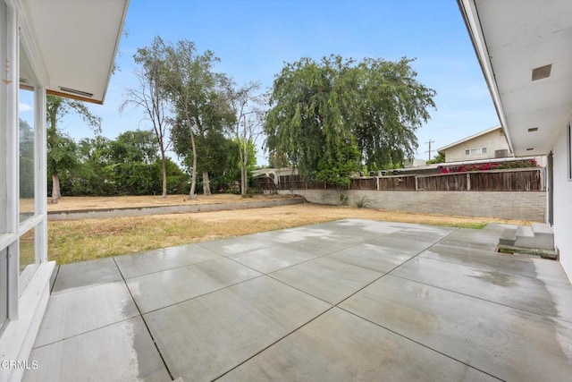 view of patio with fence