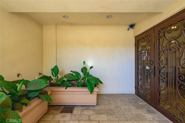 doorway to property with stucco siding