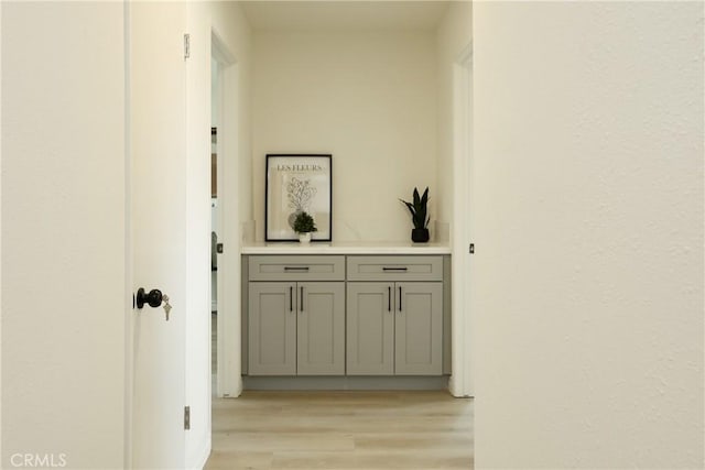 corridor featuring light wood-type flooring
