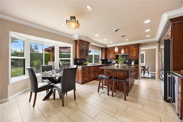 4820 Via Corzo, Yorba Linda, CA 92886 - dining room featuring baseboards, crown molding, recessed lighting, and wine cooler