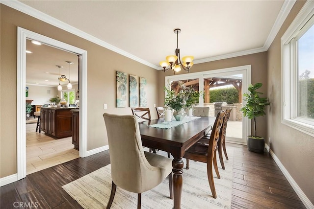 4820 Via Corzo, Yorba Linda, CA 92886 - dining space with a chandelier, plenty of natural light, ornamental molding, wood finished floors, and recessed lighting