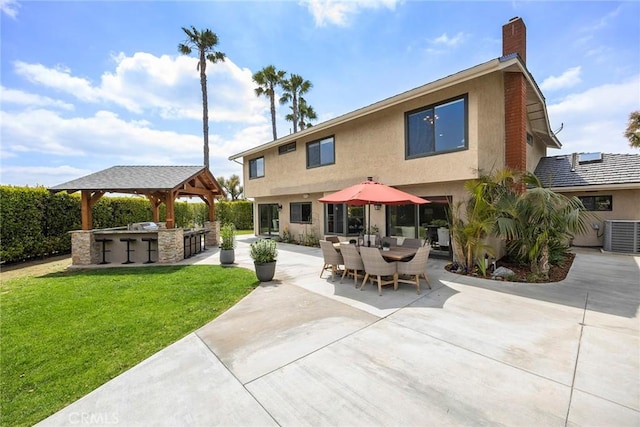 4820 Via Corzo, Yorba Linda, CA 92886 - back of property featuring a gazebo, area for grilling, stucco siding, a yard, and a patio
