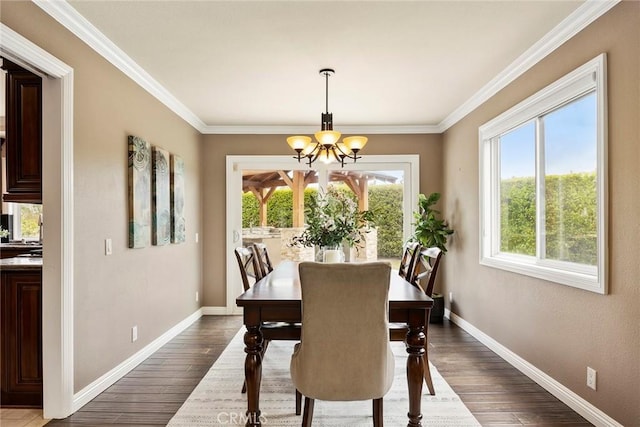 4820 Via Corzo, Yorba Linda, CA 92886 - dining area featuring a chandelier, baseboards, dark wood-type flooring, and crown molding