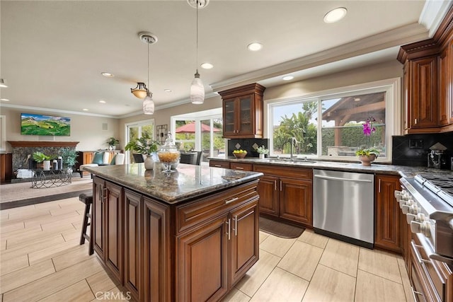 4820 Via Corzo, Yorba Linda, CA 92886 - kitchen featuring dishwasher, a sink, stove, backsplash, and crown molding