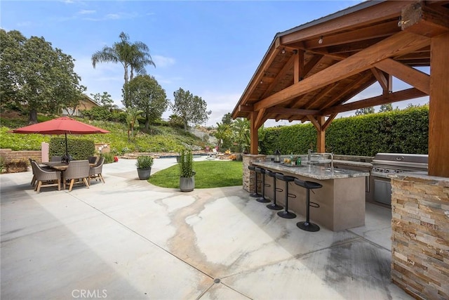 4820 Via Corzo, Yorba Linda, CA 92886 - view of patio / terrace featuring a gazebo, a bar, and outdoor dining area