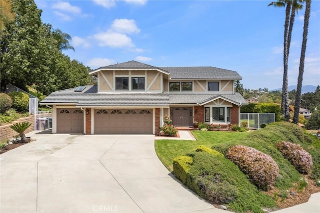 4820 Via Corzo, Yorba Linda, CA 92886 - view of front of home featuring driveway, stucco siding, a garage, an attached garage, and brick siding