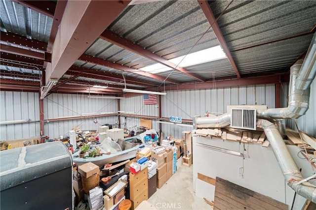 interior space with concrete floors and visible vents