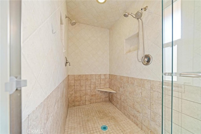 bathroom with a stall shower