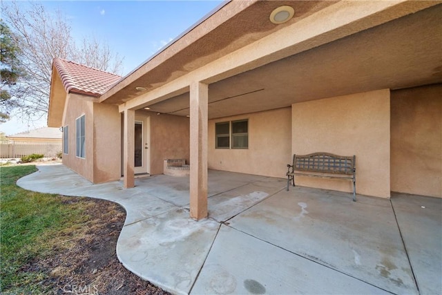view of patio / terrace with fence