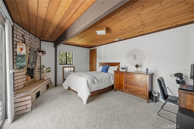 bedroom featuring a fireplace, visible vents, carpet flooring, and wood ceiling