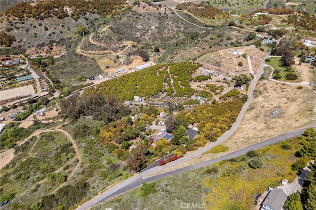 birds eye view of property featuring a rural view