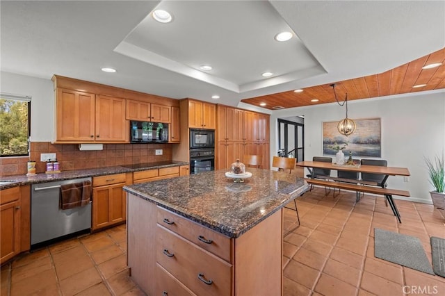 kitchen featuring recessed lighting, light tile patterned floors, a tray ceiling, black appliances, and backsplash