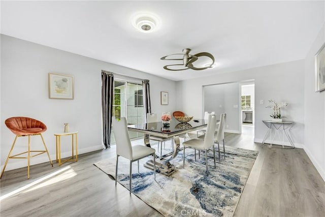 5211 Mcclintock Ave, Temple City, CA 91780 - dining room featuring plenty of natural light, a ceiling fan, baseboards, and wood finished floors