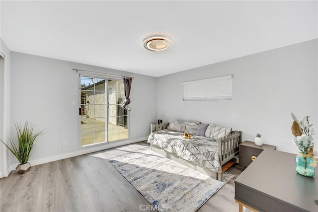 5211 Mcclintock Ave, Temple City, CA 91780 - living area featuring baseboards and wood finished floors