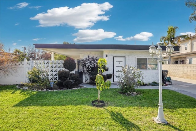 5211 Mcclintock Ave, Temple City, CA 91780 - view of front facade featuring fence and a front yard