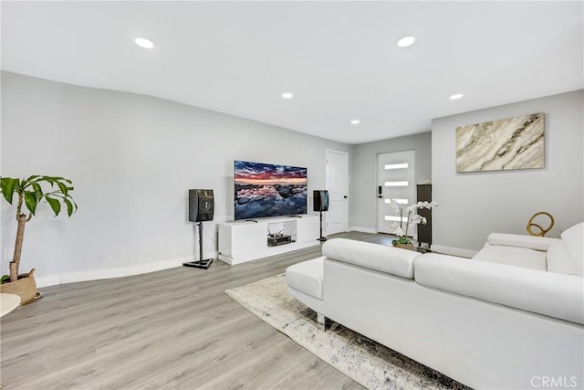 5211 Mcclintock Ave, Temple City, CA 91780 - living area featuring baseboards, recessed lighting, and light wood-style floors