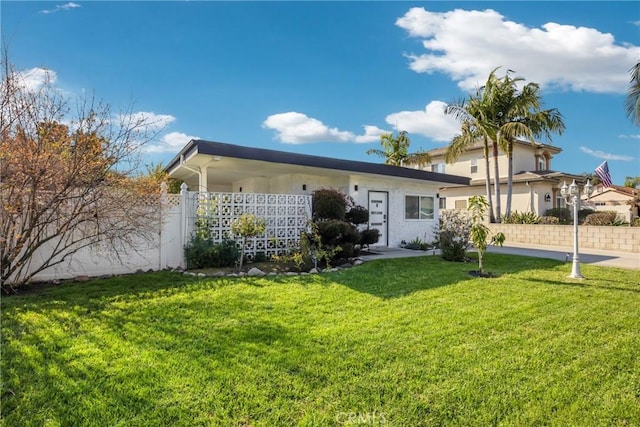 5211 Mcclintock Ave, Temple City, CA 91780 - view of front of home featuring stucco siding, a front lawn, and fence
