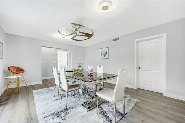 5211 Mcclintock Ave, Temple City, CA 91780 - dining space featuring baseboards, a ceiling fan, wood finished floors, and visible vents