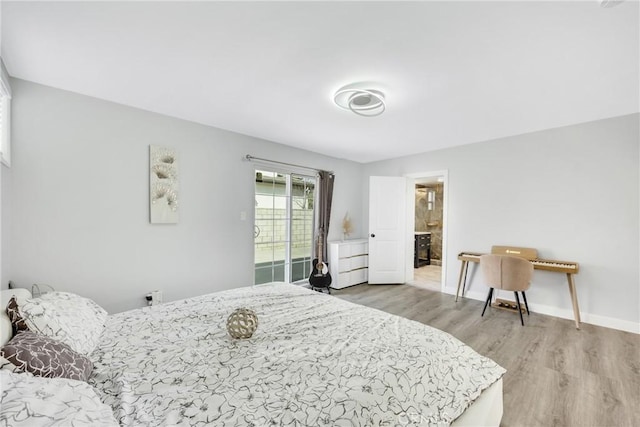 5211 Mcclintock Ave, Temple City, CA 91780 - bedroom featuring light wood-style floors, baseboards, and ensuite bath