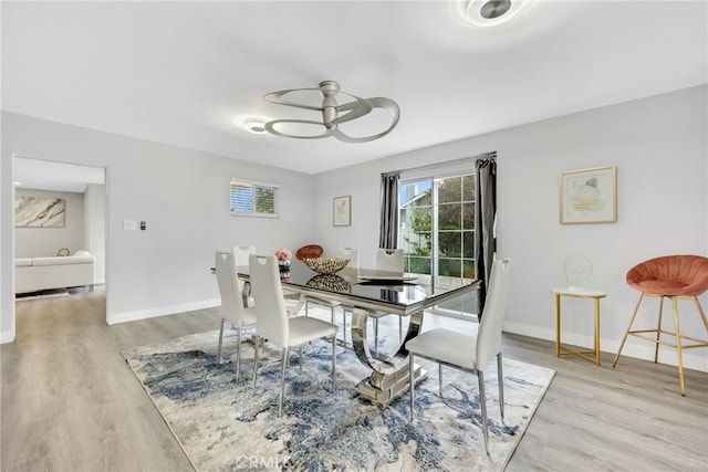 5211 Mcclintock Ave, Temple City, CA 91780 - dining area featuring baseboards and wood finished floors