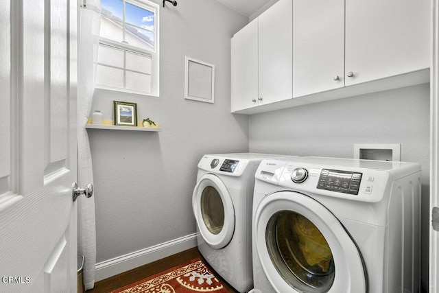 535 Starboard Ln, Port Hueneme, CA 93041 - washroom with baseboards, cabinet space, dark wood-style flooring, and washing machine and dryer