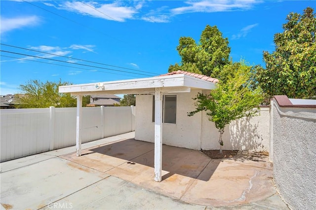 exterior space featuring fence