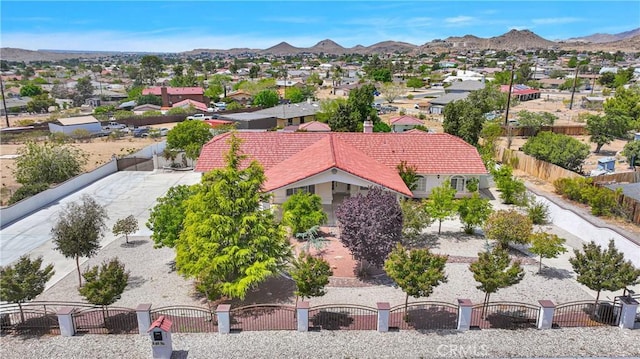 aerial view featuring a mountain view and a residential view