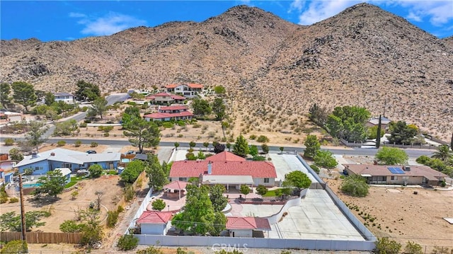 bird's eye view featuring a mountain view and a residential view