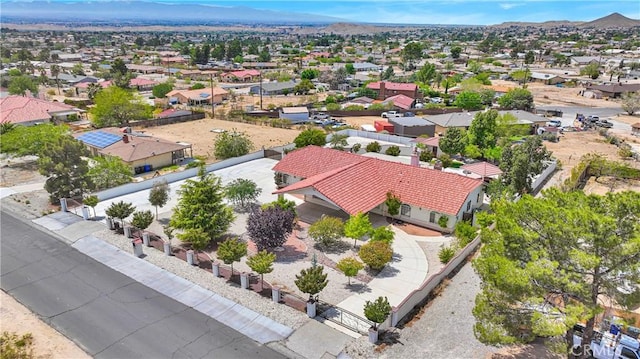 bird's eye view featuring a residential view and a mountain view