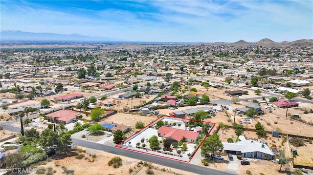 birds eye view of property with a residential view and a mountain view