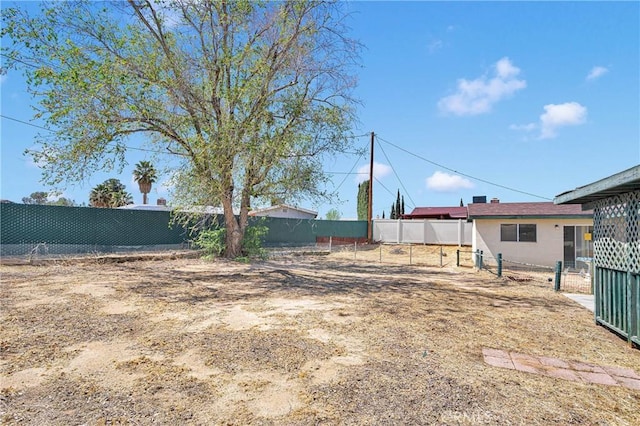 view of yard featuring fence