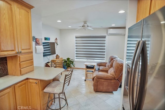 living room with recessed lighting, light tile patterned floors, ceiling fan, and an AC wall unit