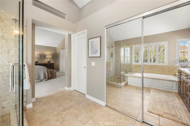 5005 Stonehaven Dr, Yorba Linda, CA 92887 - ensuite bathroom featuring lofted ceiling, a shower stall, baseboards, a garden tub, and ensuite bath